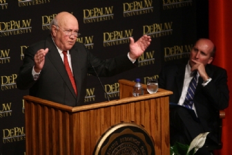 F.W. de Klerk speaking behind a lecturn with Brian Casey in the background